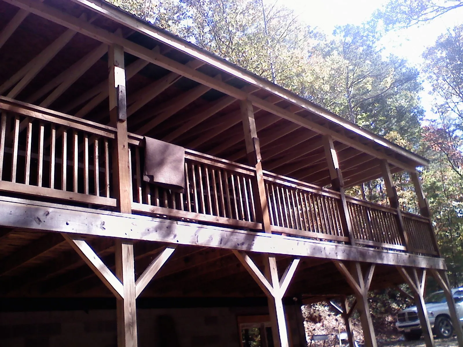 Timber framing under a new elevated porch and deck — Roof Leak Repair in Pinopolis by Roofing Brothers